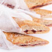 Baguette With Butter And Jam · Simple and, oh so, satisfying. Fresh sweet butter and seedless raspberry jam slathered on a ...