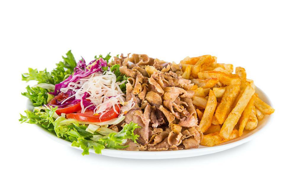 The Chicken Gyro Platter · Sizzling chicken gyro served with rice and a salad.