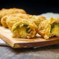 Jalapeño Poppers · Jalapeño stuffed with cheese then crisped to perfection.