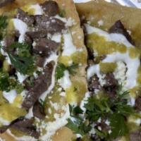 Tacos Dorados · Lechuga, tomato, crema y queso pernil, pollo, chorizo con papa, o queso