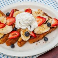 French Toast With Bananas, Strawberries Or Blueberries · 