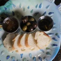 Bread And Olives · Baguette, olives and mango chutney. Serves two.