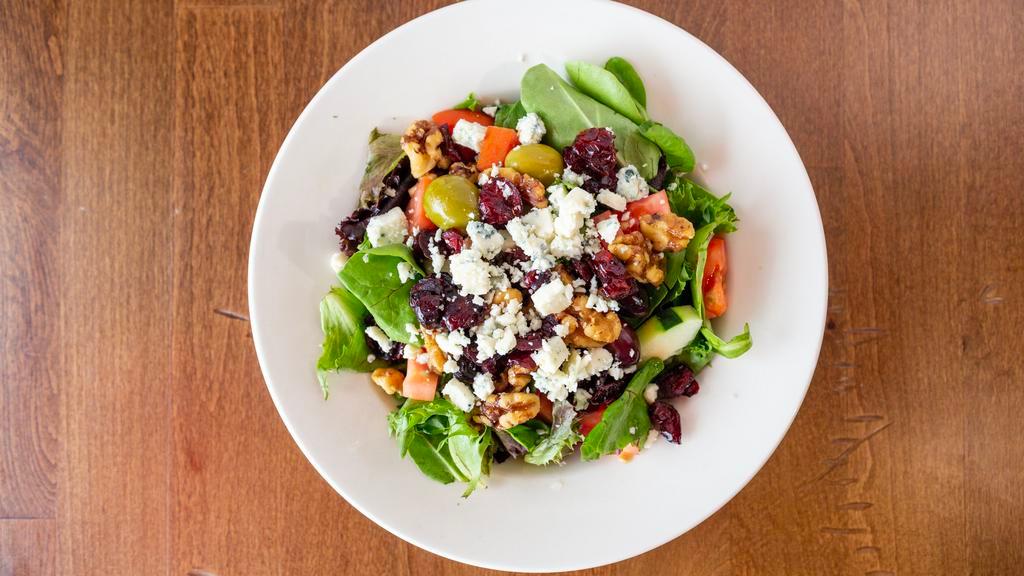 Gorgonzola Salad · Mesclun greens, gorgonzola cheese, dried cranberries, tomatoes, cucumbers, olives & caramelized walnuts.