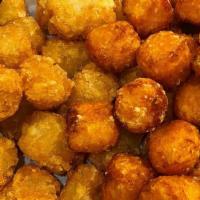 Loaded Tater Tots · Smothered with cheese wiz and bacon