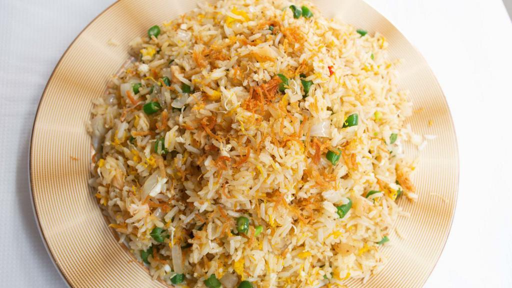 Pings Signature Crab Meat Crunchy Fried Rice · Crab meat, eggs and string bean.