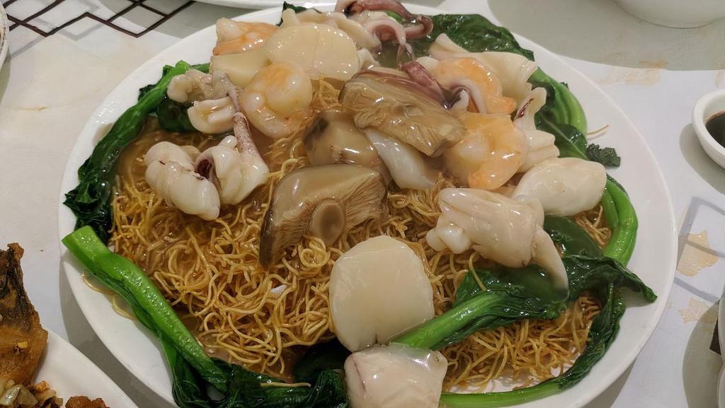 Mixed Seafood Pan-Fried Noodles · Shrimp, scallops, squid, mushrooms and veggie.