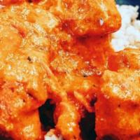 Chicken Tikka Masala · Baked white meat, onion, tomatoes, and green peppers. Cooked with yogurt and tomato sauce. S...