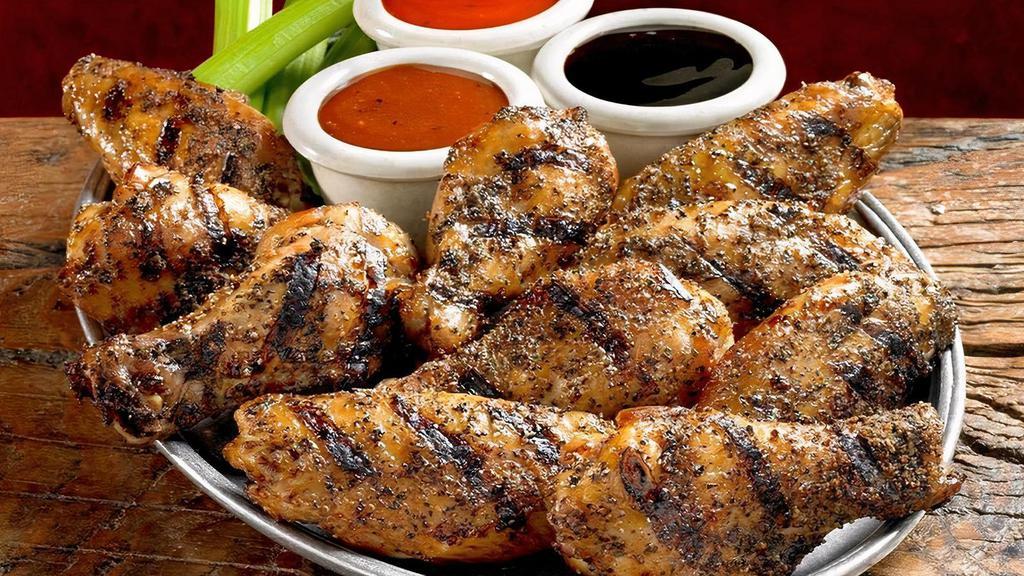 Smoked Wings · Wings are slow-smoked, then finished on the grill. May be tossed in sauce or ordered with sauce on the side