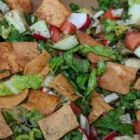 Fattoush Salad · cucumbers, tomatoes, radishes, mint & pita croutons with pomegranate dressing. vegan. gluten...