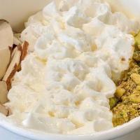 Mehliyaeh Pudding (Qty 1) · creamy, sweet milk pudding with hints of rosewater. topped with whipped cream, pistachio, an...
