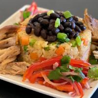 Machu Bowl · Arroz chaufa rice, black turtle beans, salsa criolla, pulled rotisserie chicken, 1 aji verde...
