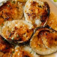 Vongole Oreganata · 1/2 dozen baked clams.