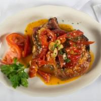 Costoletto Di Maiale Agro-Dolce · Berkshire pork chop with vinegar peppers in a White Wine Sauce