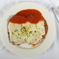 Pollo Alla Parmigiana · Breast chicken cutlet, tomato sauce, and melted mozzarella cheese.