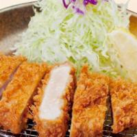 Pork Loin Cutlet Katsu · A bowl of rice and a cup of miso soup.