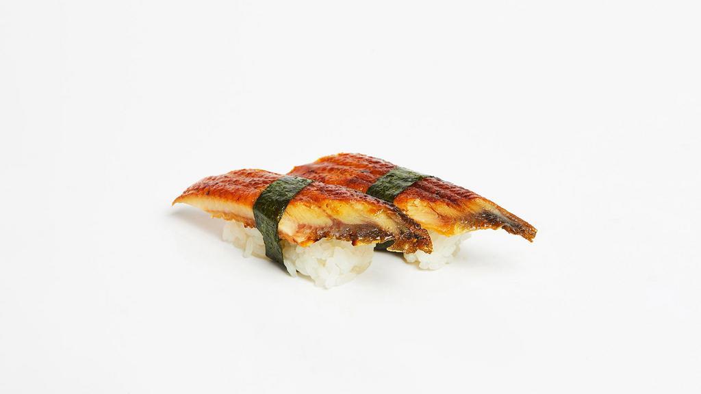 Eel Nigiri · Two pieces of fresh water eel over pressed sushi rice.