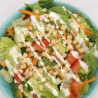 Garden Salad · lettuce, cucumber, carrot, tomato, mixed with homemade Creamy Italian dressing, topped with ...