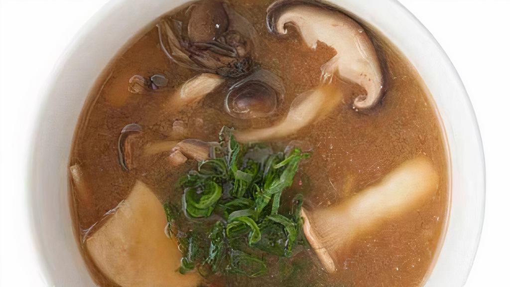 Mushroom Miso Soup · miso broth infused with mushroom, topped with tofu, seaweed, and shiitake mushrooms.