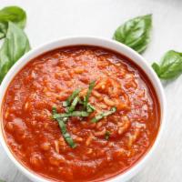 Tomato Rice Soup · Creamed tomato soup, seasoned with fresh herbs, with white rice.