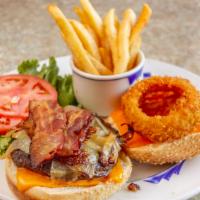 Bbq Burger · With bacon, cheddar cheese, fried onions, and barbecue sauce. Served with coleslaw and pickl...
