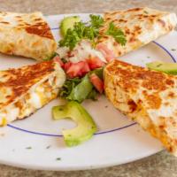Chicken Quesadilla · With assorted cheeses. Served with guacamole, sour cream, and salsa.