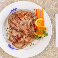 Broiled Pork Chops · With apple sauce.