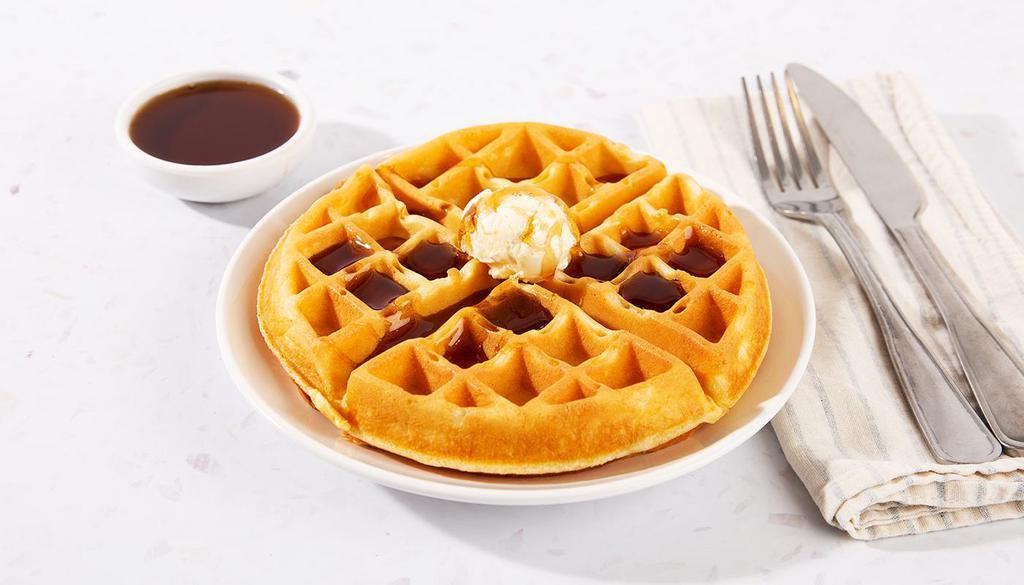Belgian Waffle · One large Belgian-style waffle topped with butter and maple syrup.