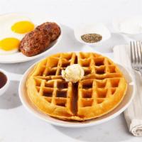 Waffle Combo · One large Belgian-style waffle served with maple syrup, plus your choice of two eggs your way.