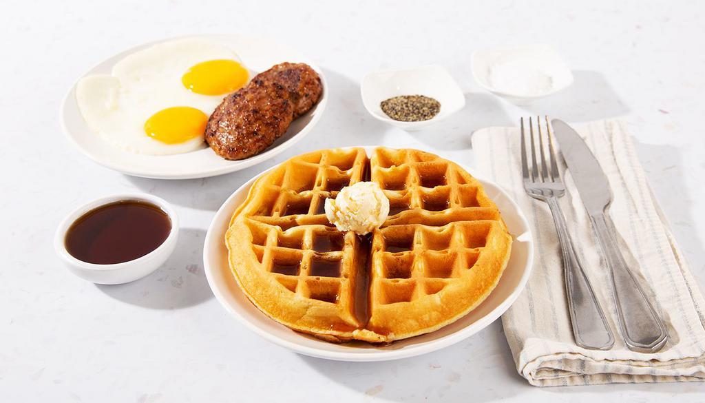 Waffle Combo · One large Belgian-style waffle served with maple syrup and powdered sugar, plus your choice of breakfast meat and two eggs your way.