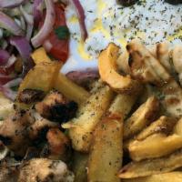 Chicken Souvlaki Platter · Two sticks of our hand skewered chicken souvlaki over our Hand Cut fries or yellow rice.
com...