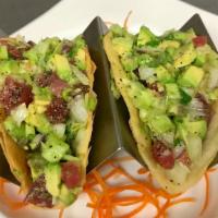 Tuna Taco Salsa Verde · 2 pieces. Raw. Diced pepper tuna, lettuce, avocado, onion, cilantro, crispy taco with salsa ...