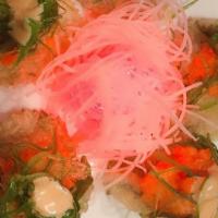 Firecracker · Raw. Japanese mint leaves tempura topped with spicy tuna or spicy salmon, seaweed and a touc...