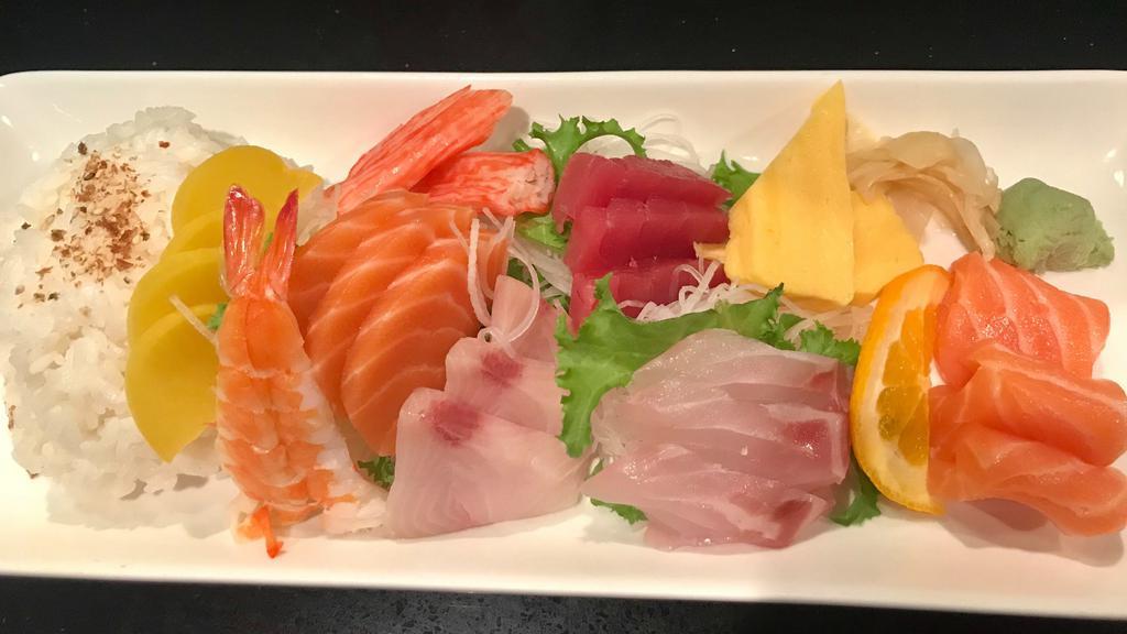 Chirashi · Raw. Assorted sashimi over bed of sushi rice.