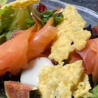 Smoked Salmon Salad · Spring mix salad topped with, thinly sliced smoked salmon, crispy parmesan chips, cherry tom...