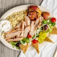 Souvlaki Dinner · Marinated grilled chicken tenders, rice, roasted potatoes, and Greek salad. Served all on on...