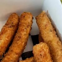 Fried Zucchini Sticks · Eight pieces. Served with a side of our homemade marinara sauce.