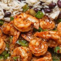 Jerk Shrimp · Grilled shrimp topped w/ jerk spices served w/ rice & peas or white rice  and steamed veggies