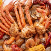 Seafood Galore · A tray filled to the brim with seafood goodness. An order each of Snow Crab Legs, Shrimp, Cr...