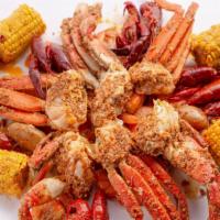 The Total Catch · An order each of Alaskan King Crab Legs, snow crab legs, easy peel shrimp and crawfish. Serv...