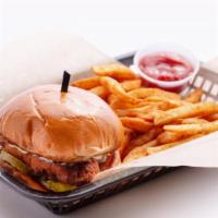 Fried Chicken Sandwich · A crispy chicken sandwich topped with cajun mayo and packed with pickles. Served with Fries.