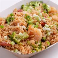 Shakin' Fried Rice · Fried rice sautéed with onions, scallions, sausage and of course our signature shaking sauce!