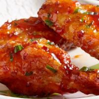 Sweet Chili Wings · 8 Sweet Chili Wings (mild heat), served with carrots & celery and a choice of blue cheese, c...