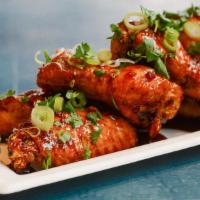 Korean Bbq Wings · 8 Korean BBQ wings (mild heat), served with carrots & celery and a choice of blue cheese, cl...