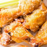 Garlic Parmesan Wings · 8 garlic parmesan wings (mild heat), served with carrots & celery and a choice of blue chees...