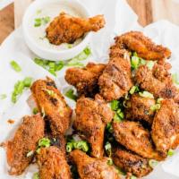 Cajun Wings · 8 Cajun dry rub wings (mild heat), served with carrots & celery and a choice of blue cheese,...