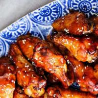 Teriyaki Wings · 8 teriyaki smoked and grilled wings (mild heat), served with carrots & celery and a choice o...