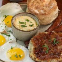 Country Boy · 3 Eggs your way served with house-made hash browns, small side of Delta Grind stone ground g...