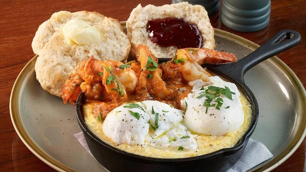 Shrimp & Grits · 3 Wild Caught U12 Shrimp Over Delta Grind Grits with our Creamy Cajun Sauce, Topped with 2 Poached Eggs & your choice of bread