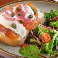 Salmon & Egg · House-Cured Salmon nestled under two poached eggs on top of Toasted Sourdough Bread with Pic...