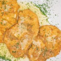 Chicken Francese · Egg battered chicken breast sauteed in a lemon, butter and white wine sauce. Served with bre...